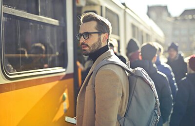Man standing in front of bus