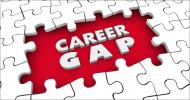 An all-white jigsaw puzzle with the word “Career Gap,” where  a section of the puzzle is missing. 